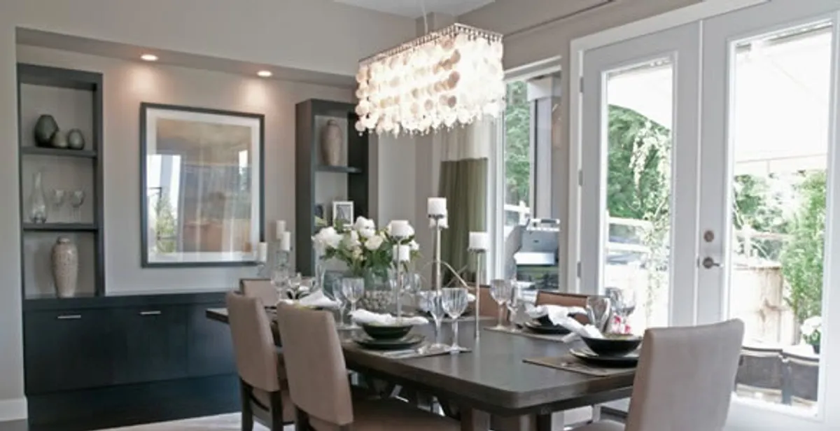 Elegant dining room chandelier installation above table in Cherry Hill, NJ