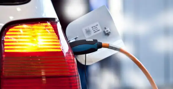 Electric car plugged into EV charger after professional installation in Cherry Hill, NJ