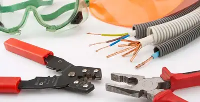 Electrical wiring repair with professional tools and safety equipment in Haddonfield, NJ