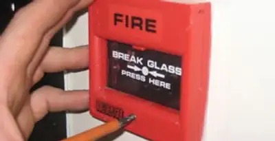 fire alarm installation service showing manual fire alarm pull station installed by licensed electricians in Cherry Hill, NJ