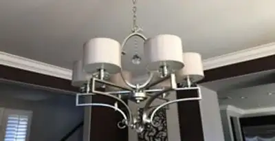 Modern chandelier installation with multiple light fixtures in Cherry Hill, NJ