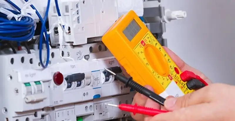 Residential electrician testing home electrical panel for safety and performance in Cherry Hill, NJ