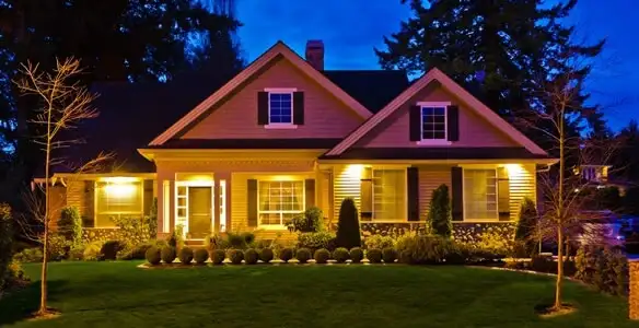 security light installation services illuminating a residential exterior at night in Cherry Hill, NJ